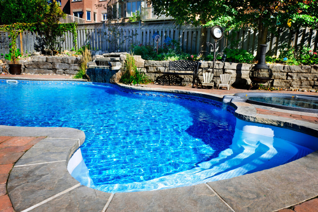 Swimming pool with waterfall - Wrigley's Pool Co